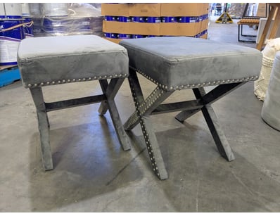 Pair of contemporary X-frame stools featuring upho...