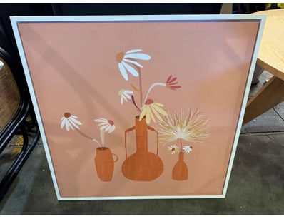 Charming framed botanical artwork featuring a mini...