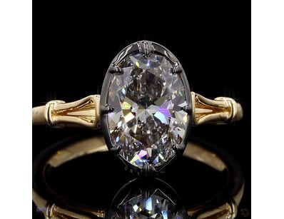 2.51 CT OVAL DARK-BEZEL SOLITAIRE RING IN 18KT YEL...