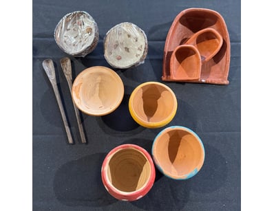 Palm timber spoons, coconut shell candles, decorat...