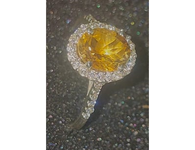 11.6 CARATS CITRINE CZ AND STERLING SILVER RING.  ...