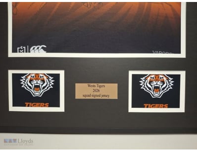 WEST TIGERS 2026 SQUAD SIGNED/FRAMED JERSEY

West ...