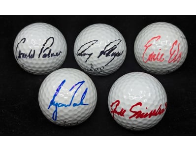 FIVE SIGNED GOLF BALLS

Signatures Include Arnol...