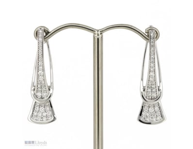 14K WHITE GOLD AND DIAMOND, CLIP EARRINGS.      

...