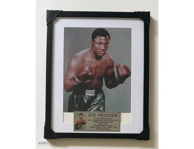 JOE FRAZIER SIGNED & FRAMED PHOTO 

A Black Framed...