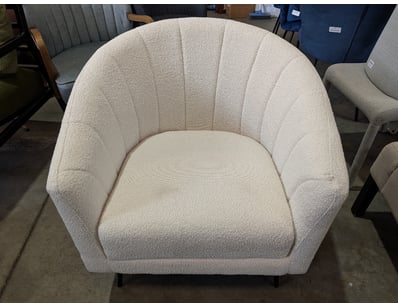 Contemporary barrel-back armchair upholstered in c...