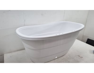 Modern freestanding acrylic soaking tub featuring ...