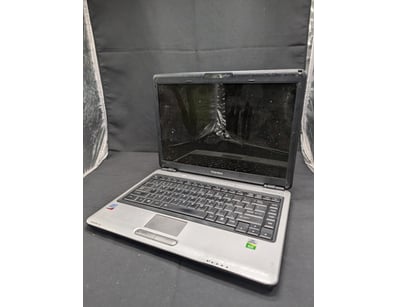Toshiba Satellite Pro M300 laptop in white and bla...