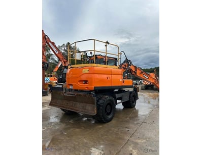 <b>2021 Doosan DX140W Wheeled Excavator - 5,853 Ho...