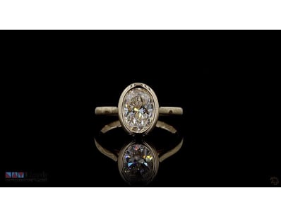 2.01 CT OVAL BEZEL SOLITAIRE RING IN 18KT YELLOW G...