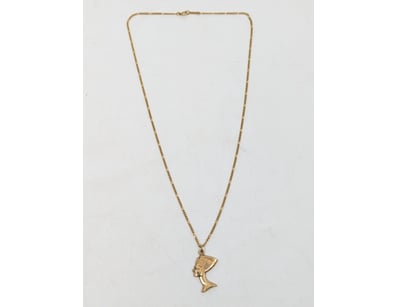 9k yellow gold chain with pharaoh pendant, total i...