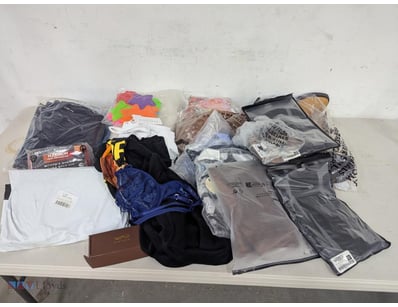 Assorted clothing including jeans, shirts boots an...