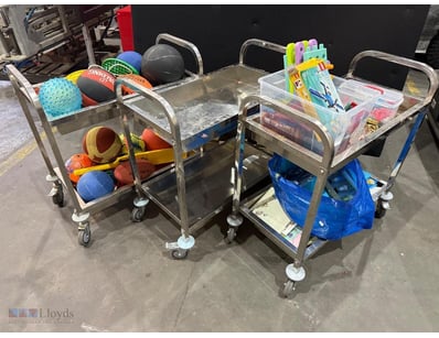 Three mobile service trolleys with two-tier shelvi...