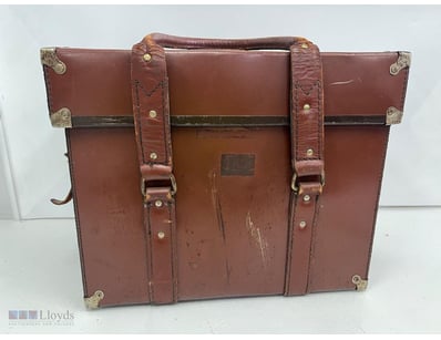 VINTAGE LEATHER TRAVEL TRUNK WITH AVIATION PARTS

...