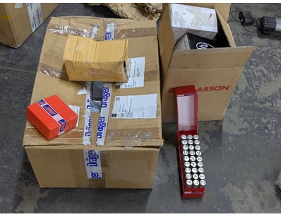 Parts, including alphabet punch set, Dräger Pulsar...