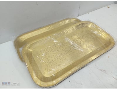 Pair of gold-coloured decorative Metal serving tra...