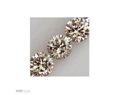 0.12 TCW LIGHT BROWN 3 ROUND DIAMOND         

Con...