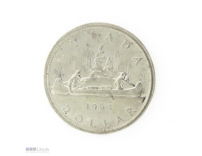 1 X 1963 CANADIAN VOYAGEUR SILVER DOLLAR.
     

T...