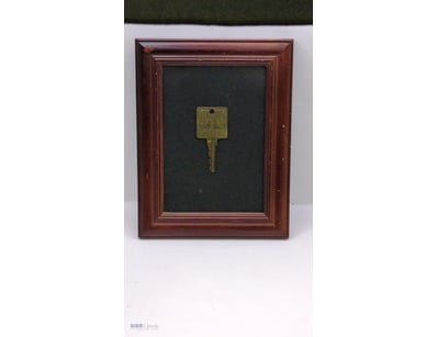FRAMED HILTON HOTEL BRASS KEY

Item Size: Height: ...