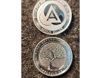 1/10TH OZ SILVER ROUND - AINSLIE. 99.99 FINE SILVE...
