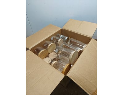 Glassware, including various sized glass canisters...