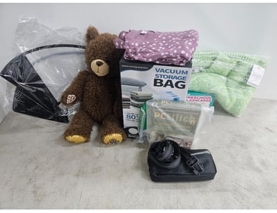 Assorted goods, including teddy bear, kids clothin...