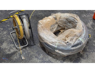 Tools, includes 2 x cable pullers on a reel and 1 ...