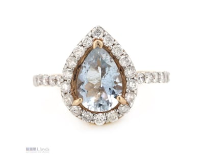 14K ROSE GOLD, AQUAMARINE AND DIAMOND, HALO RING. ...