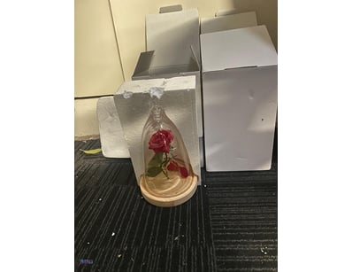 Enchanting preserved red rose display piece featur...