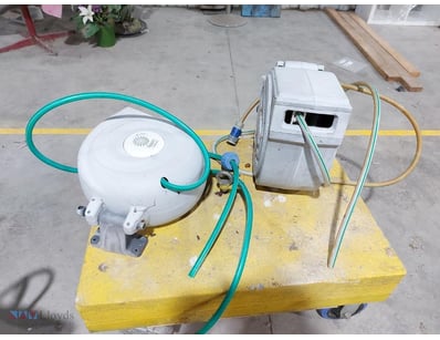 Retractable Hose Reels - Lot includes two retracta...