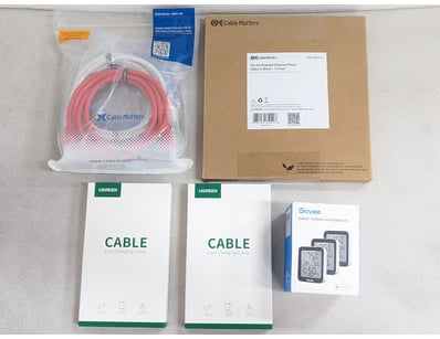 Collection of electrical cables and govee smart th...