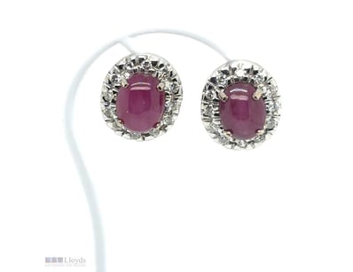 18CT WHITE GOLD RUBY AND DIAMOND EARRINGS

Featuri...