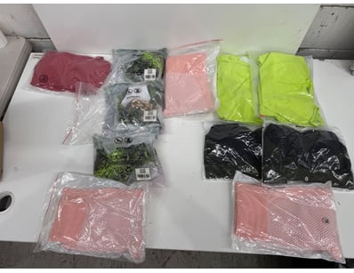Bulk activewear and swimwear collection comprising...