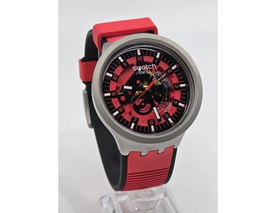 SWATCH SWISS AUTOMATIC SKELETON WATCH WITH RED AND...