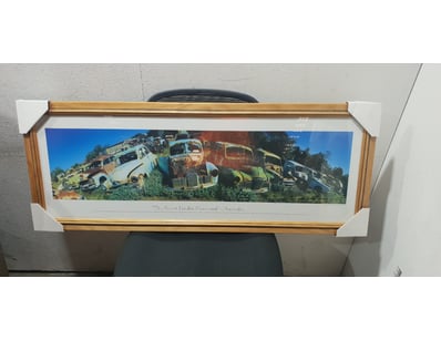 Framed panoramic print titled "The Secret Holden G...