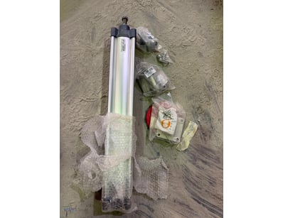 Unused Pneumatic cylinder assembly kit featuring a...