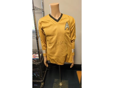 SIGNED WILLIAM SHATNER YELLOW STAR TREK UNIFORM

I...