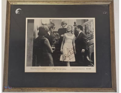 SIGNED LOBBY CARD FROM "A VERY PRIVATE AFFAIR" (19...