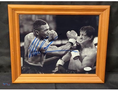 AUTOGRAPHED PHOTOGRAPH OF MIKE TYSON.

Item Size: ...