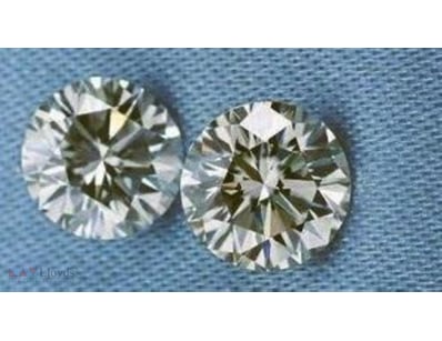 0.06 CARAT LIGHT BROWN 2 ROUND DIAMOND         

C...