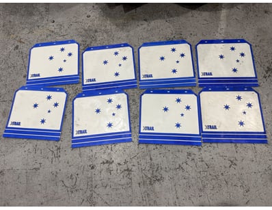 Set of eight vintage X-TRAIL branded mud flaps. As...