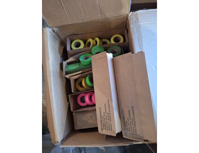 Bulk lot of coloured adhesive tape rolls in assort...