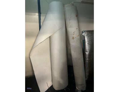 Rolled insulation materials in white fiberglass or...