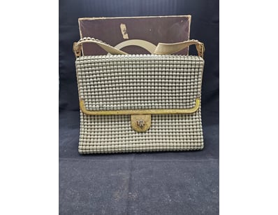 OROTON BEADED HANDBAG WITH ORIGINAL BOX

Item Si...