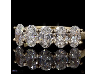 2.02 CT OVAL FIVE-STONE BAND IN 18KT YELLOW GOLD 
...