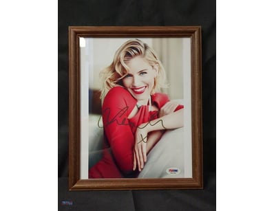 THIS IMAGE FEATURES A FRAMED, AUTOGRAPHED PHOTOGRA...