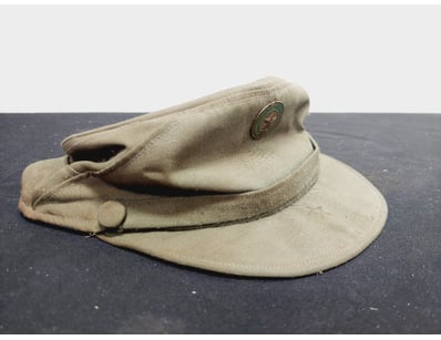 VINTAGE MILITARY SERVICE CAP WITH ENAMEL BADGE

...