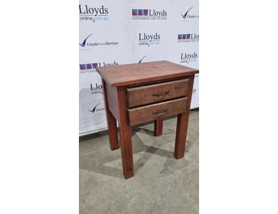 Timber side table featuring two drawers with metal...
