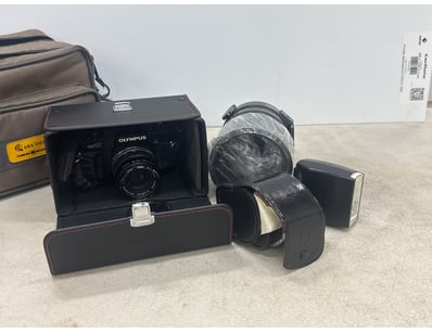 Vintage Olympus camera collection comprising two S...