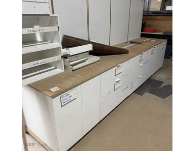 Workbench with 6 draws and 5 cupboards. Filled wit...